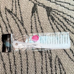 Paul Mitchell Pro Tools Detangler Comb, a wide-tooth comb